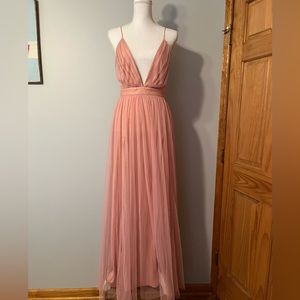 Simple and elegant. Beautiful blush colored formal dress size medium.